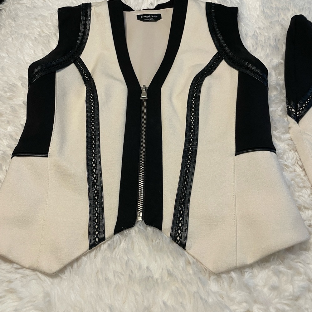Bebe corset zip up top and skirt.